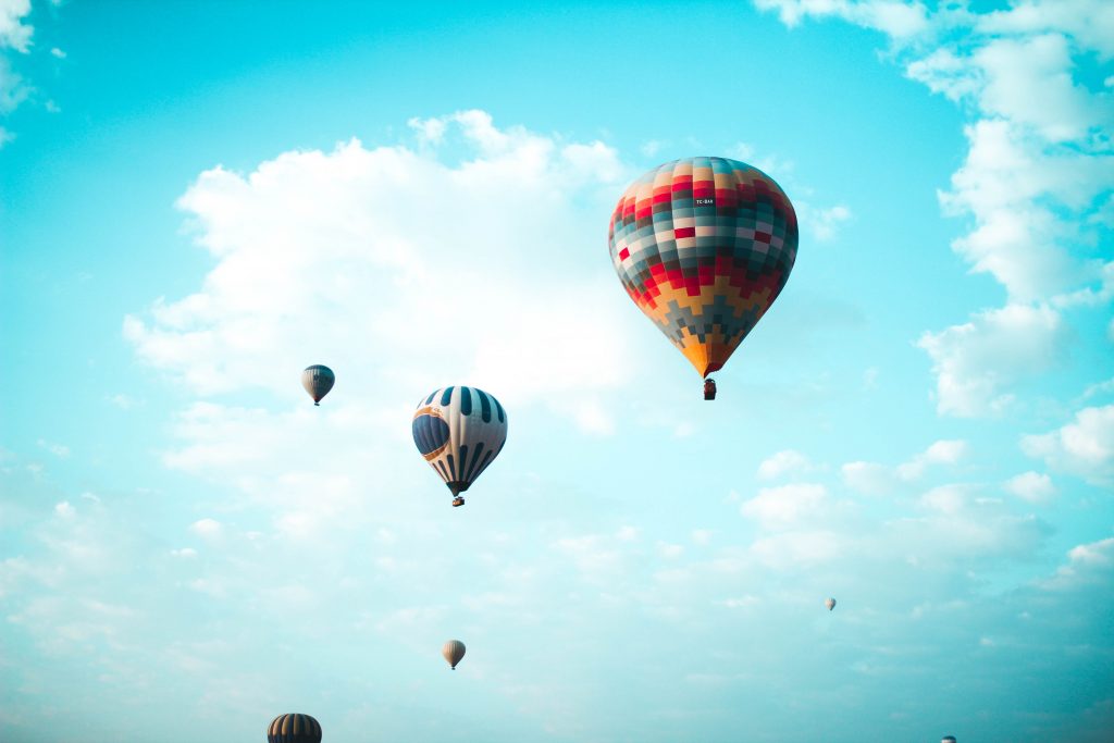 Hot Air Balloons:
Photo "Dreams" by Pars Sahin on Unsplash